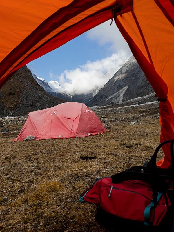 two tents set up at Kyajo Ri Base Camp