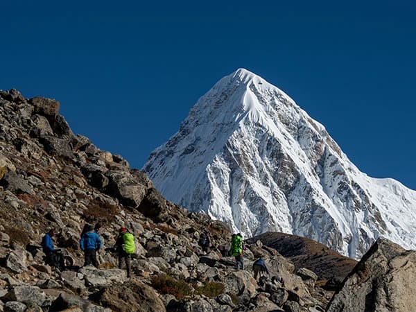 Trekking across the Khumbu moraine on the way to Gorakshep from Lobuche on day 12 of the Everest Three Passes Trek